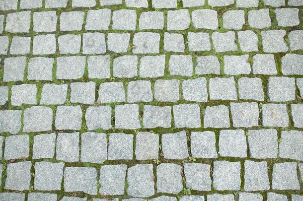 花岗岩灰色圆石人行道抽象的背景