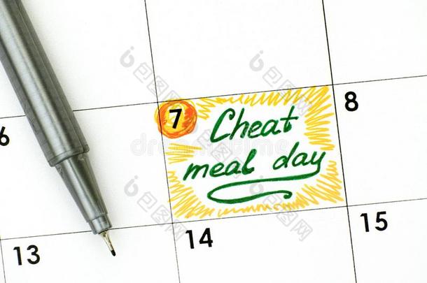 令人回忆起的东西欺骗餐一天采用日历和绿色的笔.