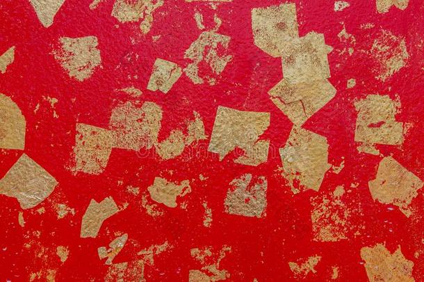 抽象的背景质地红色的水泥墙和金箔阿塔奇
