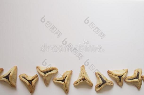 传统的普林节三角的糕点充满的和figures数字