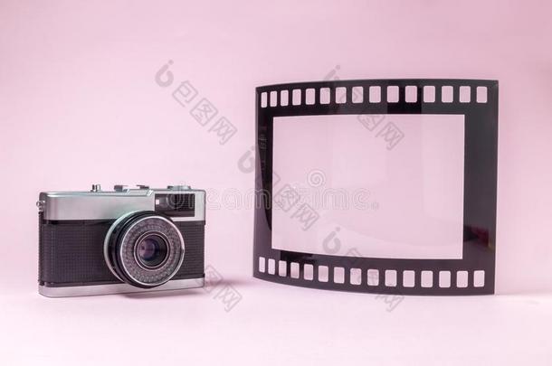 老的式的摄影照相机和照片框架采用形状关于费尔