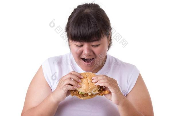 肥的亚洲人女人吃喝醉了的鸡汉堡包隔离的向白色的