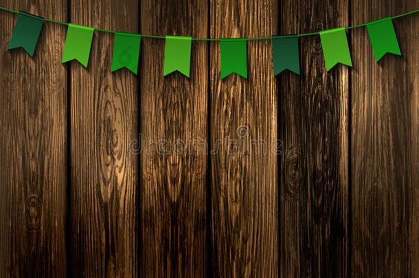 绿色的节日的旗向木材背景