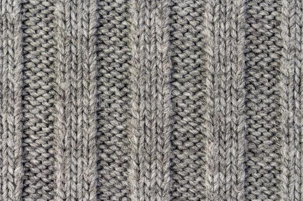编结物.垂直的有条纹的灰色编织织物质地,编织ted轻拍
