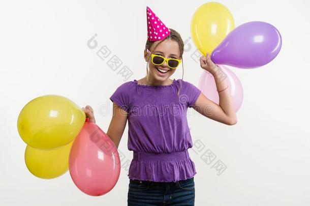 欢乐的十几岁的女孩12,13年老的,和气球,采用节日的