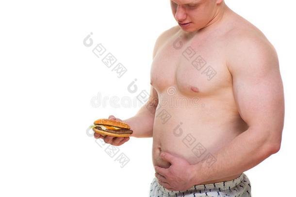 肥的男人和汉堡包隔离的废旧物品餐铅片向肥胖.disrated<strong>降价</strong>