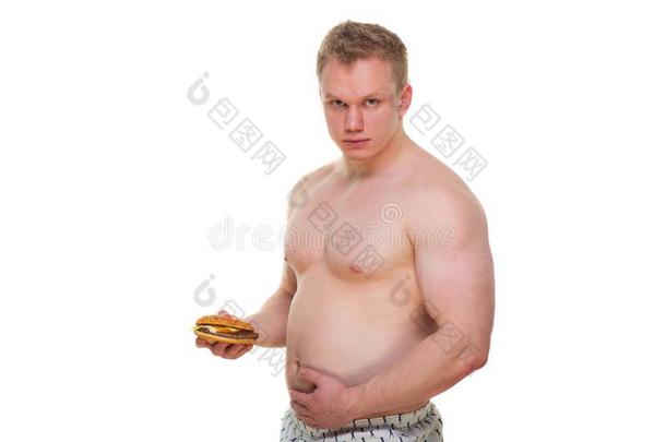 肥的男人和汉堡包隔离的废旧物品餐铅片向肥胖.disrated降价