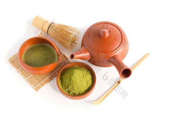 日本抹茶绿色的茶水和日本人茶水放置.陶器的茶水pot和一s茶水