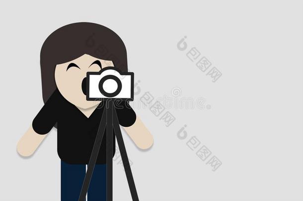 摄影师迷人的照片使用数字的照相机
