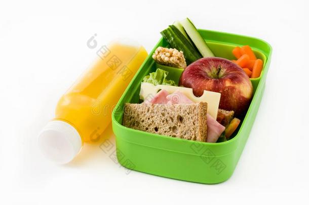 健康的学校午餐:三明治,蔬菜,成果和果汁弧点元