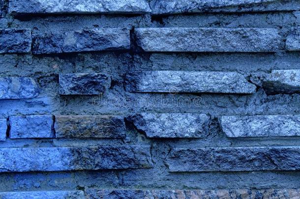 海军牡丹蹩脚货砖墙质地,背景关于石头,岩石
