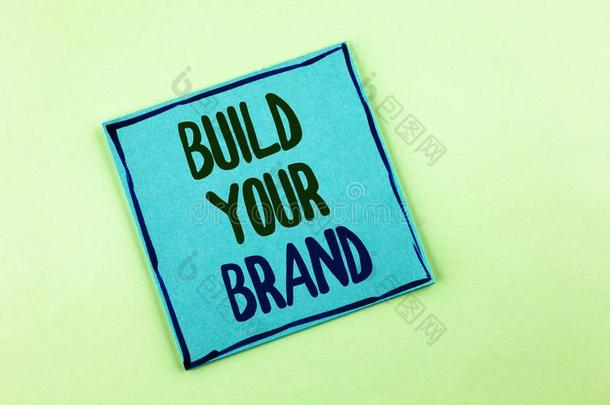 观念的手文字展映建造你的商标.商业照片
