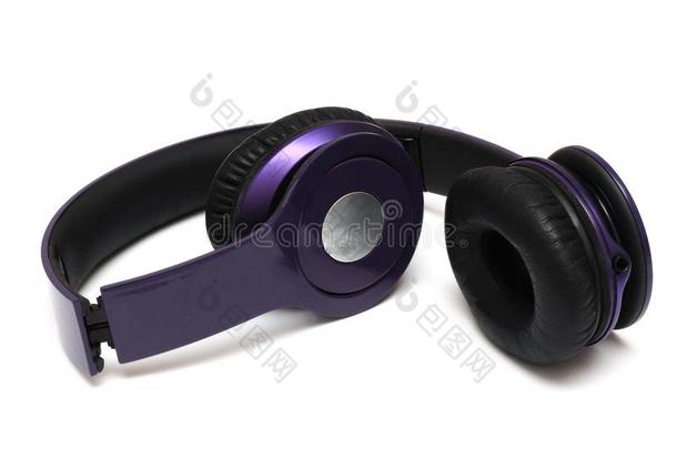 一可折叠的紫色的不用电线的戴在头上的收话器