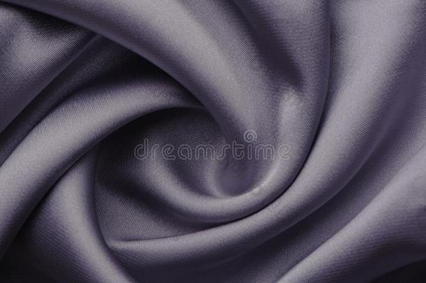 抽象的背景奢侈布或液体波浪或波状的折叠关于