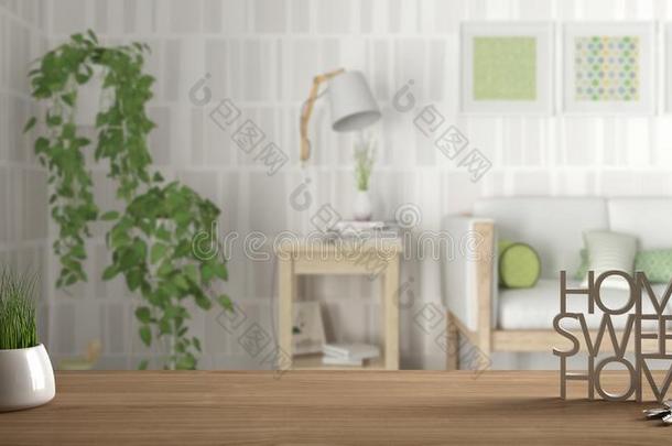 木制的表,书桌或架子和盆栽的草植物,房屋调