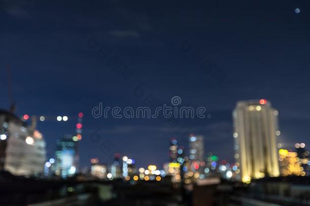 城市风光照片抽象的焦外成像背景,城市风光照片在黎明时间,