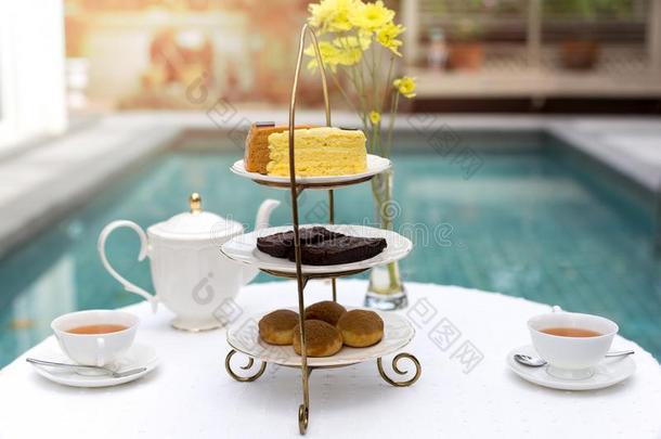 下午茶水和杯子关于茶水和茶水pot向表和蛋糕