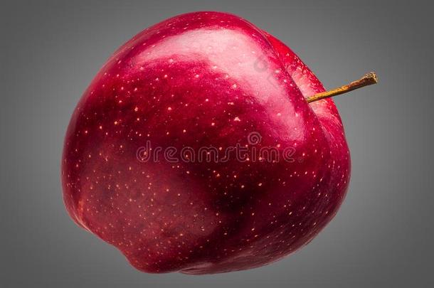 单一的美味的红色的<strong>苹果</strong>向<strong>灰色</strong>的背景