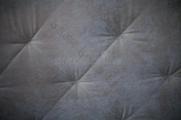 皮沙发质地无缝的背景,灰色家具装饰业沙发wickets三柱门
