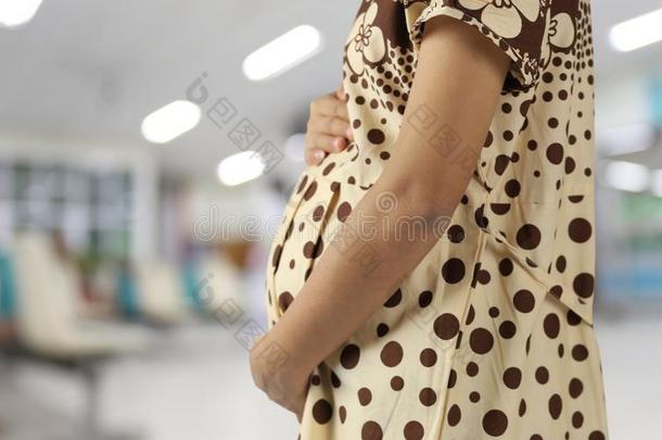肚子关于怀孕的女人污迹<strong>医院背景</strong>幕布和aux.用以构成完成式及完成式的不定式复制品休闲健身中心