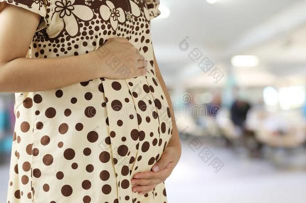 肚子关于怀孕的女人污迹<strong>医院背景</strong>幕布和aux.用以构成完成式及完成式的不定式复制品休闲健身中心
