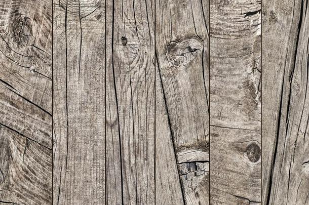 照片关于老的风化的有裂缝的有<strong>节</strong>的松树木材地板