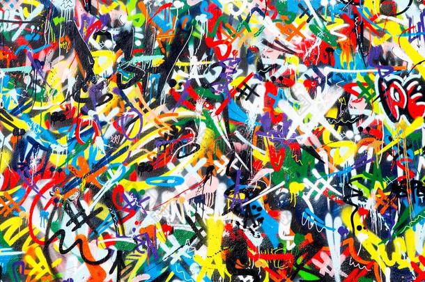 抽象的富有色彩的在墙上的乱涂乱写墙背景
