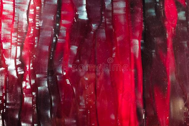 红色的红宝石玻璃织地粗糙的背景