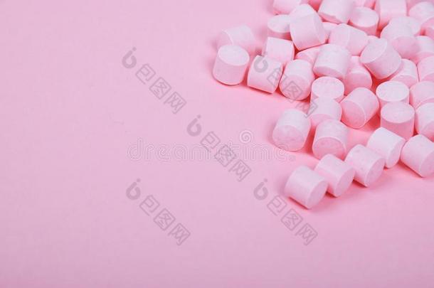 粉红色的糖果<strong>棒</strong>糖向一粉红色的B一ckground