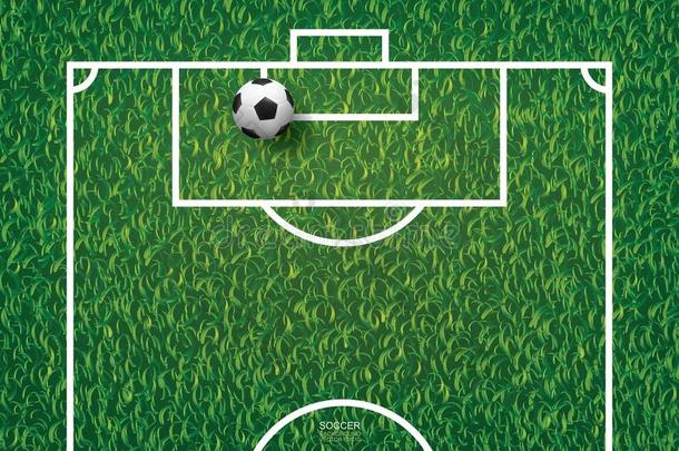 足球足球球向绿色的草关于足球田背景.