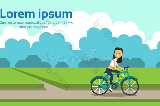 女人骑脚踏车兜风自行车城市公园绿色的草地树样板风景