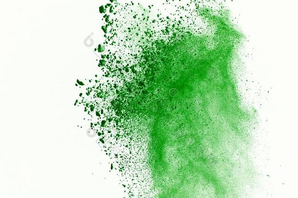 爆炸关于有色的粉向白色的背景.绿色的灰尘explode爆炸