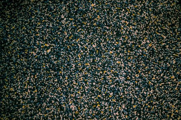 黑的和米黄色地面地毯质地.