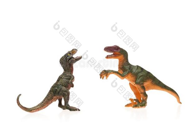 玩具恐龙向白色的隔离的背景