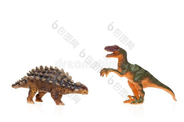 玩具恐龙向白色的隔离的背景