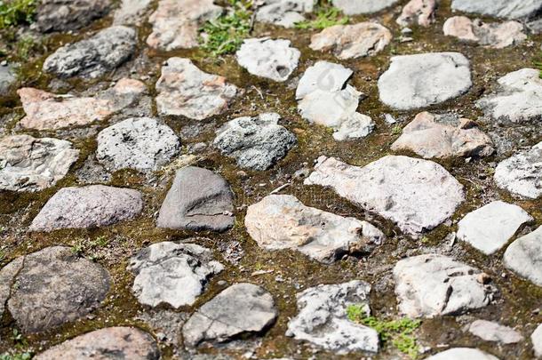 块石面路石头宏指令看法.酿酒的路面花岗岩赛跑者起跑时脚底所撑的木块模式.