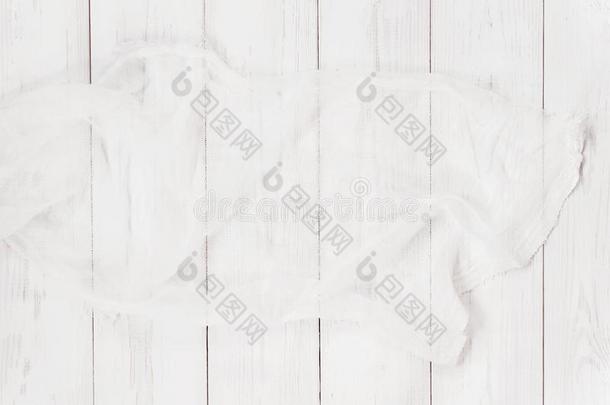 白色的织地粗糙的木制的背景和纱布