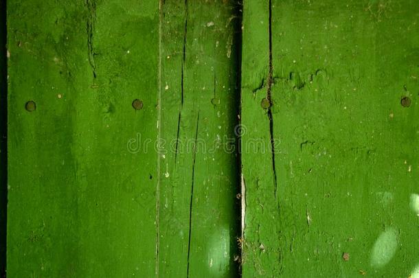 酸味的绿色的木制的老的加衬背景和打开