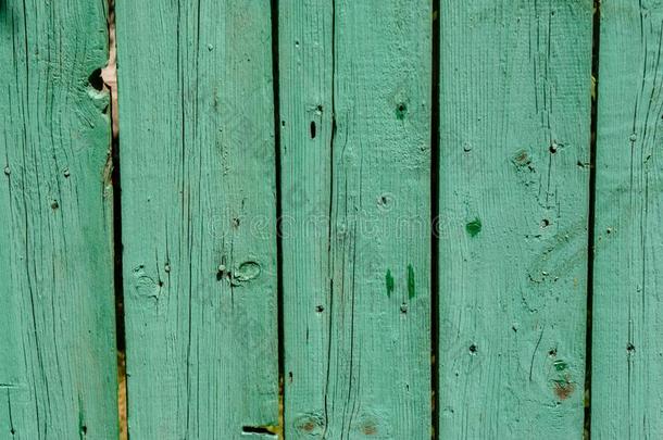 绿色的木制的老的已褪色的加衬背景和打开