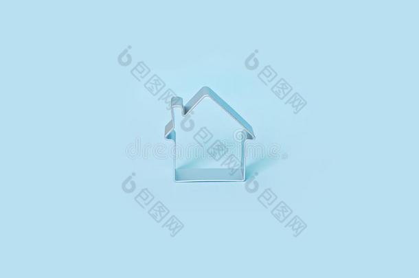 简单的形状关于小的房屋隔离的向蓝色背景.