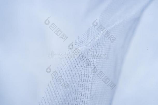 白色的薄纱布料及服装业或所经售的货物为背景