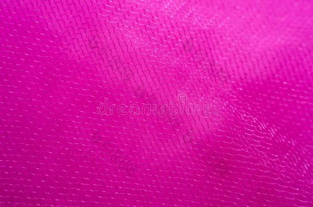 粉红色的薄纱布料及服装业或所经售的货物为背景