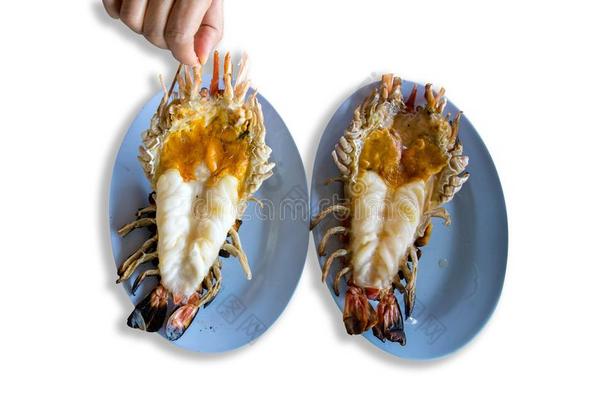 烤烤的巨人河虾或对虾向蓝色盘子,ThaiAirwaysInternational泰航国际