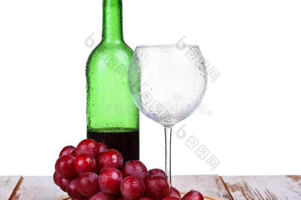 葡萄酒玻璃和红色的葡萄酒,瓶子关于葡萄酒和葡萄
