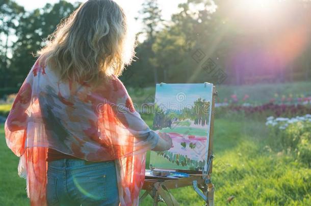 指已提到的人画家绘画颜料油上油漆采用指已提到的人花园在日落