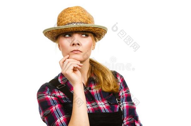 思考女人使人疲乏的太阳帽子和<strong>粗布</strong>工作服