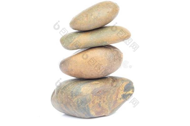 平衡卵石石头白色的背景,休闲健身中心总念反对票