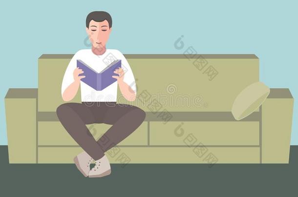 男人坐向沙发和阅读书