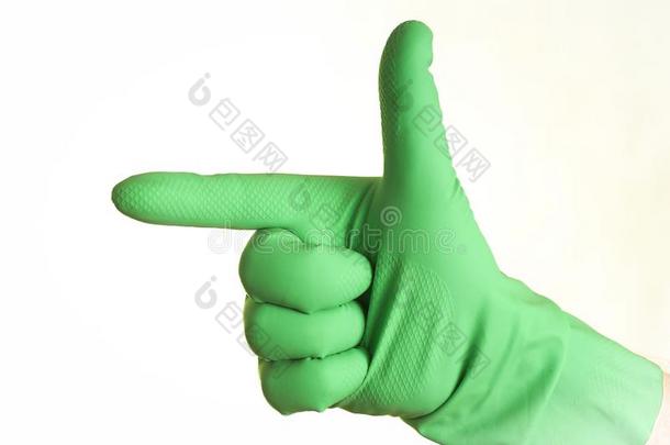 一手采用绿色的手套向一白色的b一ckground