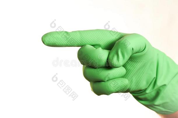 一手采用绿色的手套向一白色的b一ckground